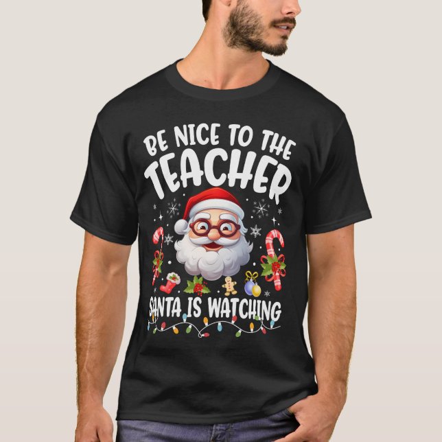 Camiseta Estar Agradable Con El Profesor Santa Está Viendo  (Anverso)