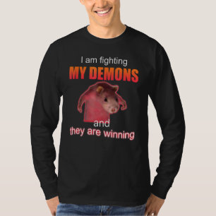 Camiseta Estoy luchando contra mis demonios y ellos están g