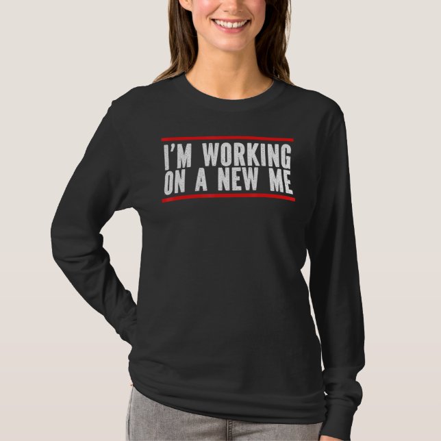 Camiseta Estoy Trabajando En Una Nueva Ataque Para Concienc (Anverso)
