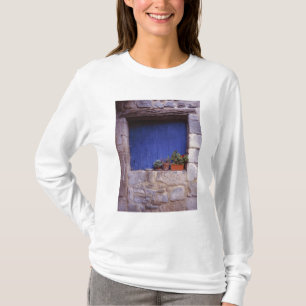 Camiseta Europa, Francia, Cereste. Una puerta azul añade c