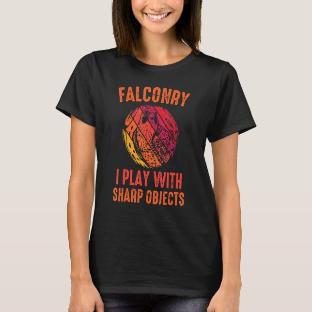 Camiseta Falcon - Falconería que juego con objetos afilados (Anverso)