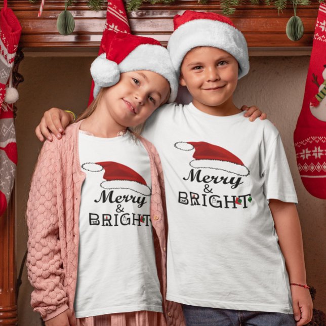 Camiseta Feliz y brillante con niños Navidades de Santa Hat (Merry & Bright with Santa Hat Christmas Kids T-Shirt)
