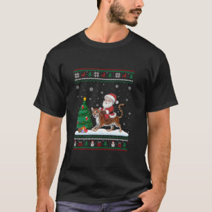 Camiseta Feo árbol de Navidad enciende Navidad Santa Riding