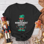Camiseta Fiesta de equipo de Elf Office para navidades y co<br><div class="desc">¡Consigue que tu equipo de oficina, familia o amigos se metan en el espíritu de las vacaciones con nuestras graciosas camisetas de Navidades! Perfecto para fiestas de oficina, reuniones familiares o eventos festivos, estos camisetas le dan un toque divertido a la temporada de vacaciones. Ya sea por trabajo, ropa de...</div>