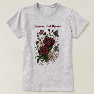 Camiseta floral inspiradora "Floreció, no rota"