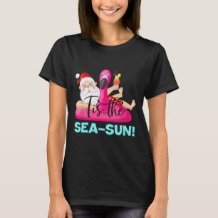 Camiseta Flotador de flamenco de Santa Claus es la Navidad 
