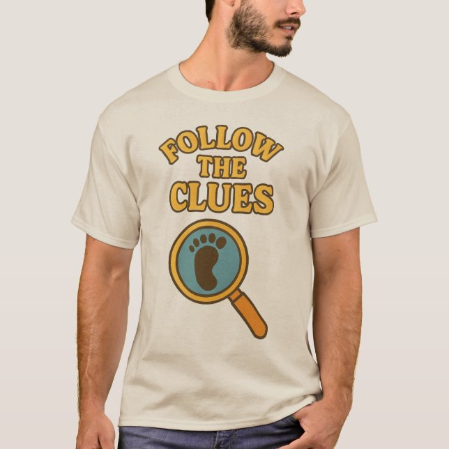 Camiseta “Follow the Clues” T-Shirt (Anverso)
