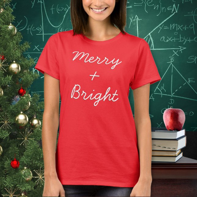 Camiseta Funny Plus Rótulo Matemáticas Navidades brillantes (A festive t-shirt with 'Merry + Bright' in a script font. The plus sign adds a mathematical touch)