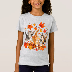 Camiseta Gatitos juguetones persiguiendo hojas de otoño
