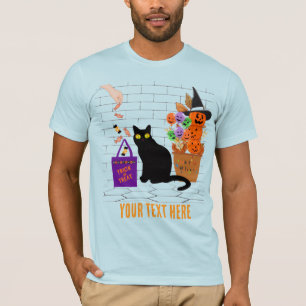 Camiseta gato conectado con una calabaza en Halloween edita