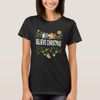 Camiseta Gato Feliz Cree Navidad con Hermosa Flor Silvestre