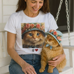 Camiseta Gato Naranja con Sombrero Azul y Flores Amante de