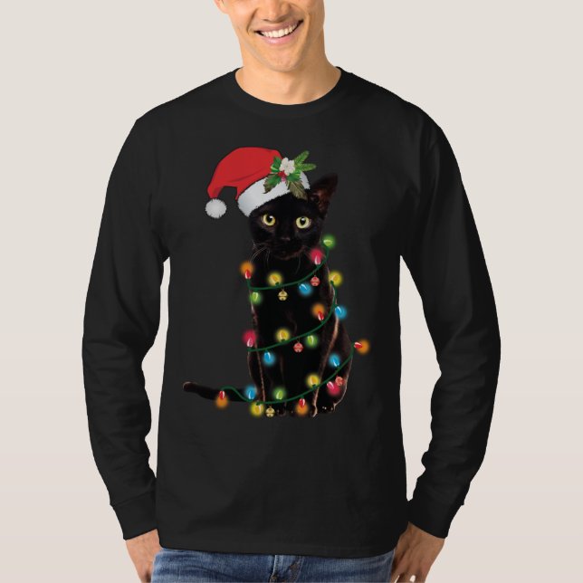 Camiseta Gato negro de Santa enredado en luz de árbol de Na (Anverso)
