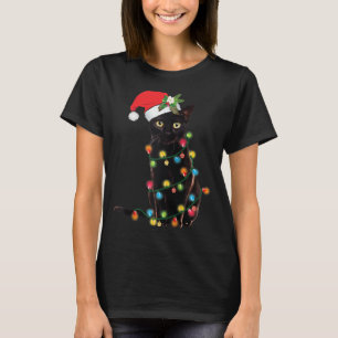 Camiseta Gato negro de Santa enredado en luz de árbol de Na