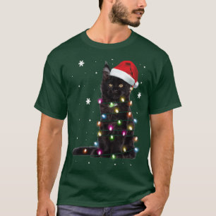 Camiseta Gato negro de Santa enredado en luz de árbol de Na