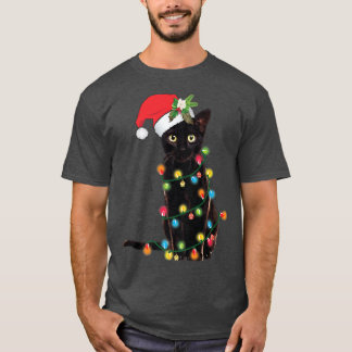 Camiseta Gato negro de Santa enredado en luz de árbol de Na