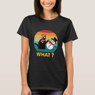 Camiseta Gato negro divertido empujando al muñeco de nieve