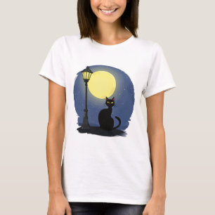 Camiseta Gato negro sentado tranquilamente bajo un brillo
