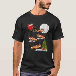 Camiseta Gracioso árbol de alumbrado navideño Santa Riding 