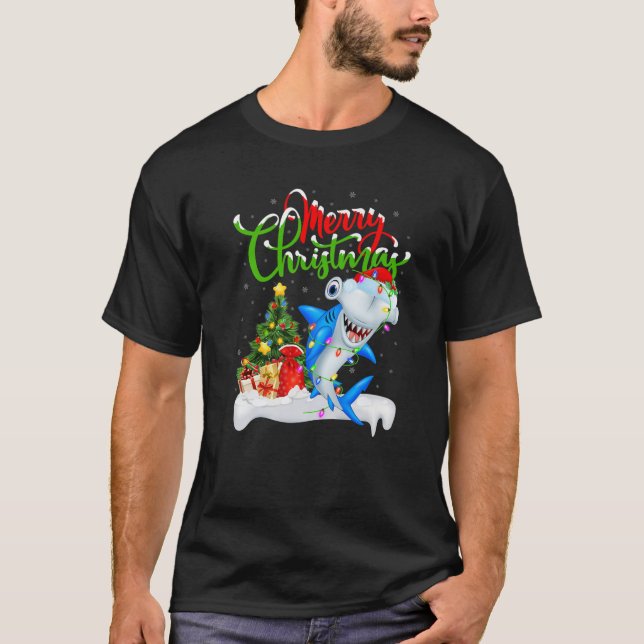 Camiseta Gracioso tiburón amante Navidad iluminando tiburón (Anverso)