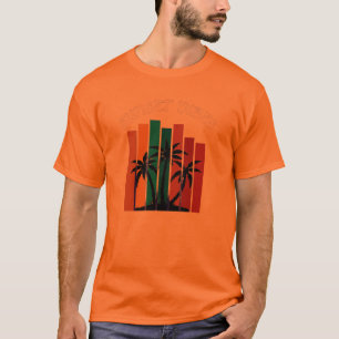 Camiseta gráfica de naranja con palmeras y vibraci