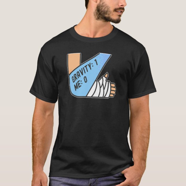 Camiseta Gravedad 1 Yo 0  Fractura de brazo (Anverso)