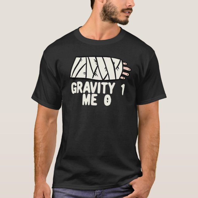 Camiseta Gravedad 1 Yo 0  Fractura de brazo 3 (Anverso)