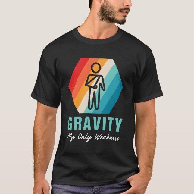 Camiseta Gravity Mi Única Debilidad Broken Arm Shoulder Sur (Anverso)