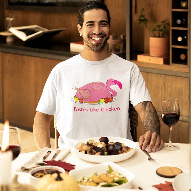 Camiseta Gusto Como El Flamingo Funny De Pollo (male model at a holiday dinner wearing pink flamingo tastes like chicken funny t-shirt)