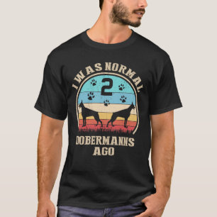 Camiseta Hace 2 perros Dobermann era normal