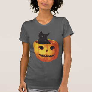 Camiseta Halloween antiguo, gato negro lindo en una calabaz