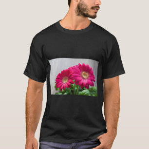 Camiseta Hermoso logotipo de flores rosadas