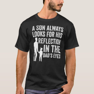 Camiseta Hombres, un hijo siempre busca a su papá a los ojo