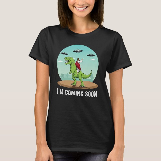 Camiseta I m Coming Soon Jesus Riding On A Dinosaur UFO Ali (Anverso)