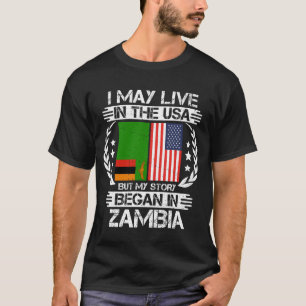 Camiseta I May Live In The USA But My Story Began In Zambia