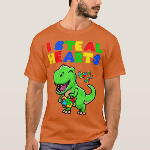 Camiseta I Steal Hearts Autism Awareness Puzzle T Rex Dinos