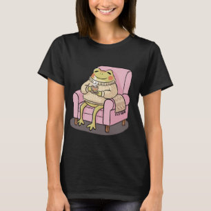 Camiseta Ilustración de rana acogedora bebiendo té en sofá