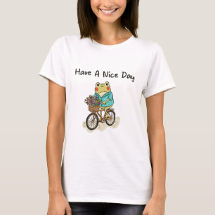 Camiseta Ilustración de rana caprichosa montando una bicicl