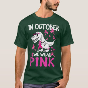Camiseta In October We Wear Pink Ribbon T Rex Dinosaur Brea