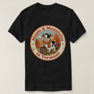 Camiseta Insígnia Retro Vermont: Vaca Acogedora con Bufanda