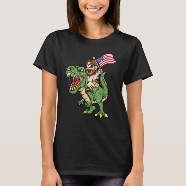Camiseta Jesus Riding A Tyrannosaurus Rex Dinosaur USA Flag (Anverso)