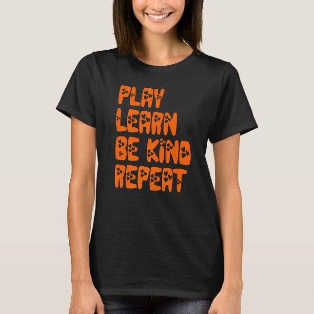 Camiseta Jugar Aprender a ser amable Repetir el Día de la A (Anverso)