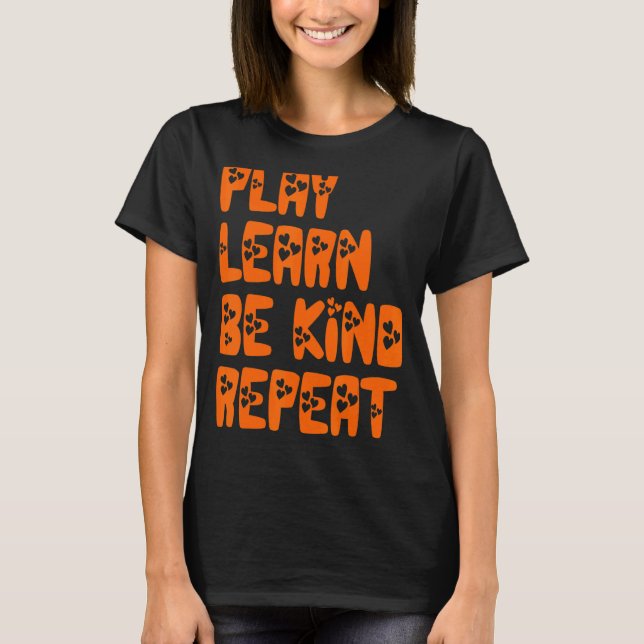 Camiseta Jugar Aprender a ser amable Repetir el Día de la A (Anverso)