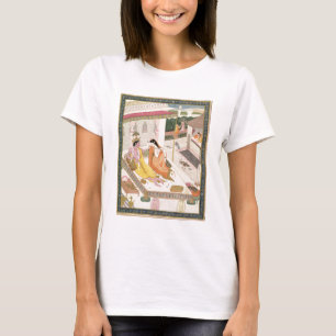 Camiseta Krishna y Radha sobre una cama en un palacio de Mo