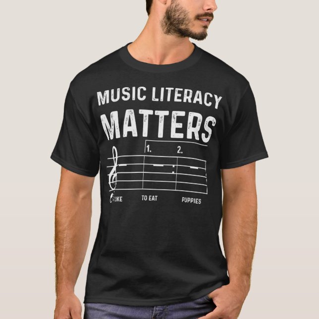Camiseta La Alfabetización Musical Importa Que Me Gusta Com (Anverso)