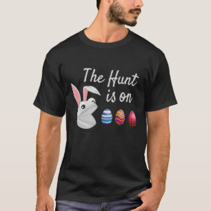 Camiseta La cacería es por la caza de huevos conejitos de 