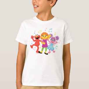 Camiseta La calle Sésamo Julia, Elmo y Abby bailando