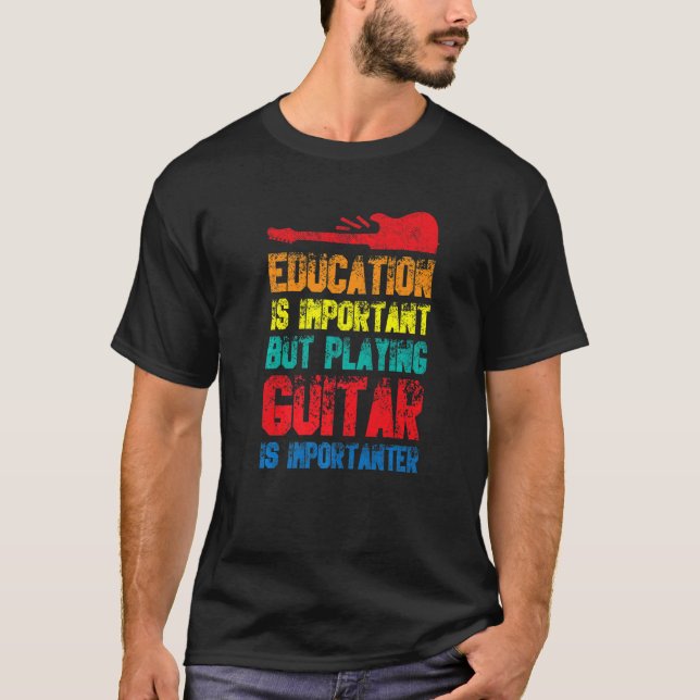 Camiseta La Educación Es Importante, Pero Jugar Guitarra Es (Anverso)