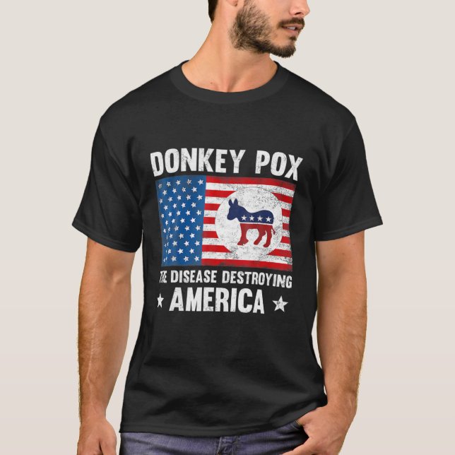 Camiseta La Enfermedad Que Destruye A Estados Unidos Es Div (Anverso)