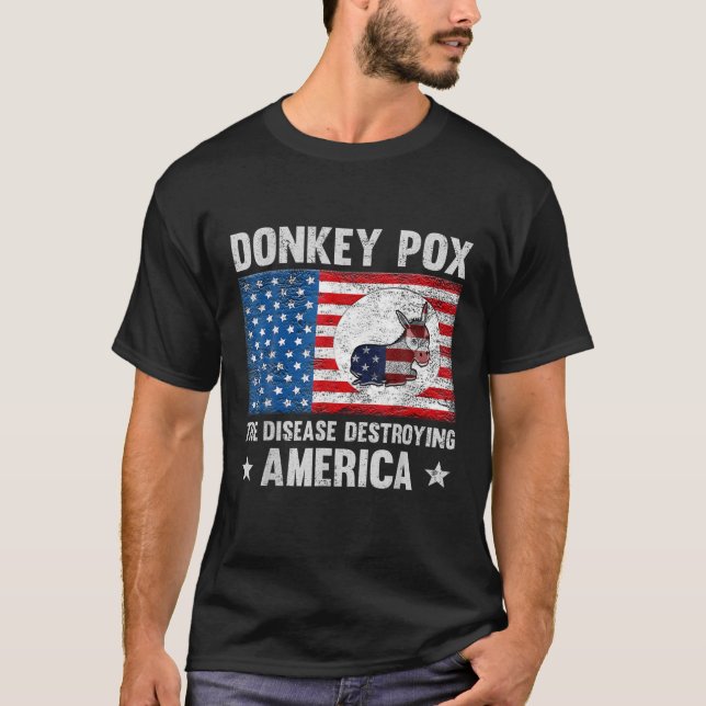 Camiseta La Enfermedad Que Destruye A Estados Unidos Es Div (Anverso)